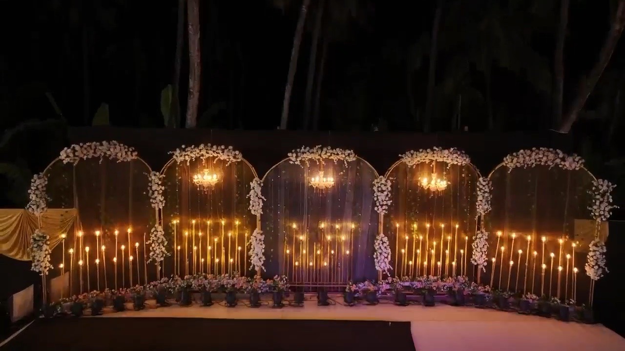 Stage with lit arches and candles