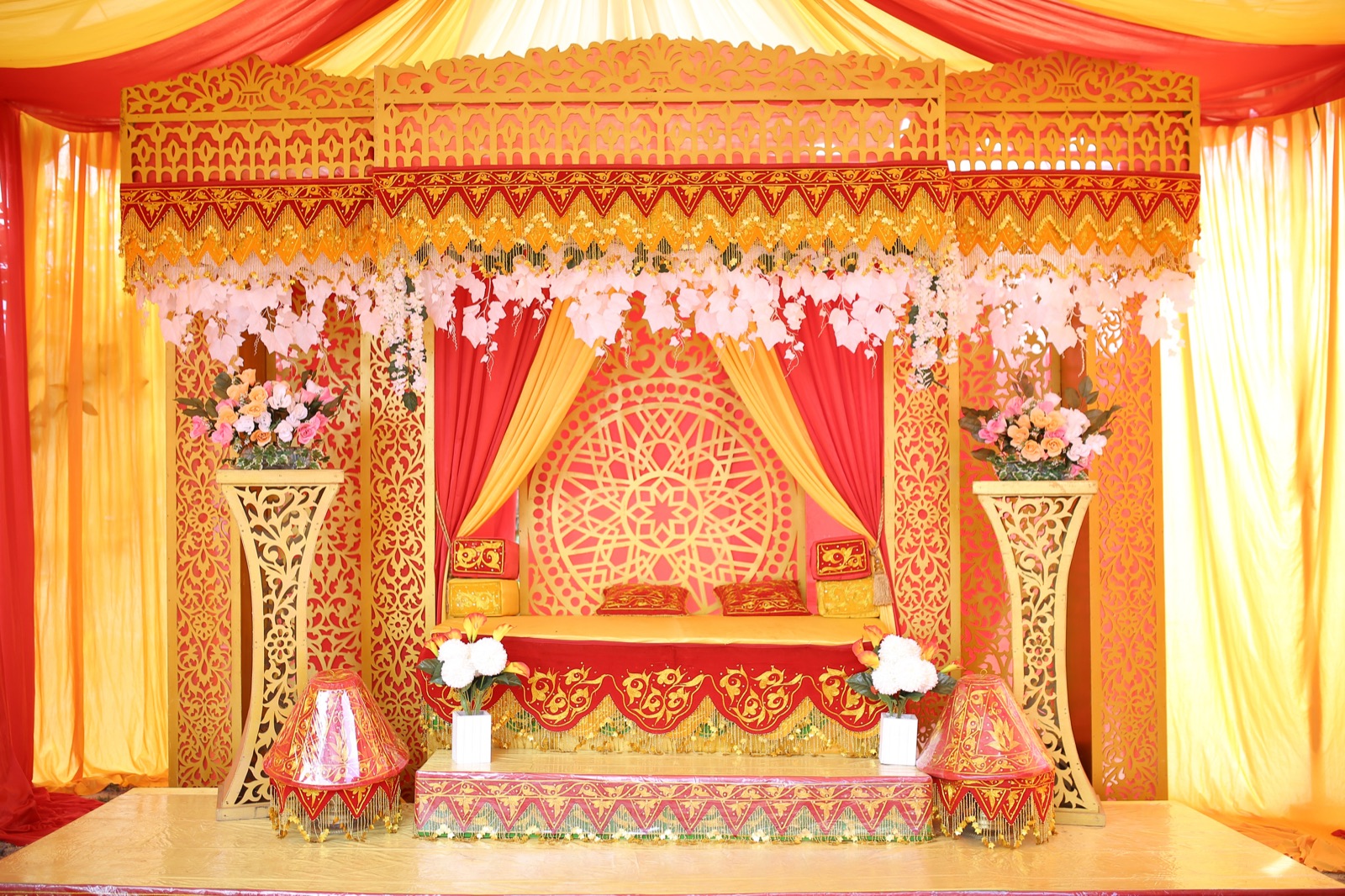Traditional red and gold mandap