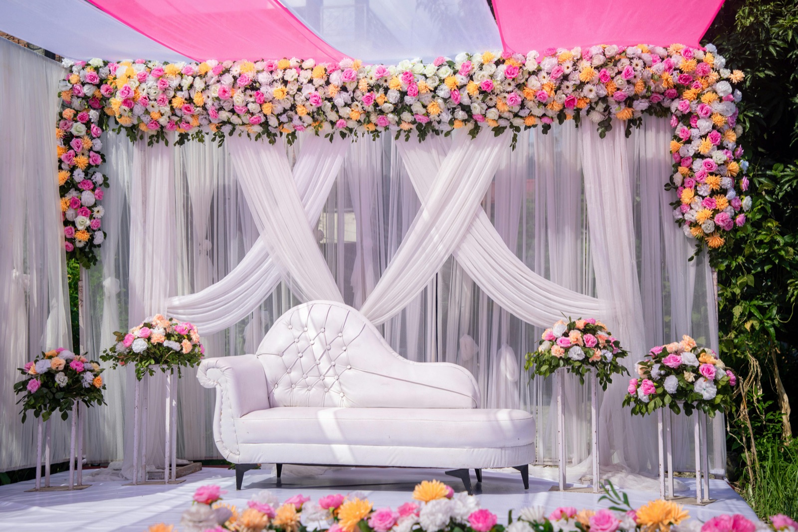 White floral stage with sofa